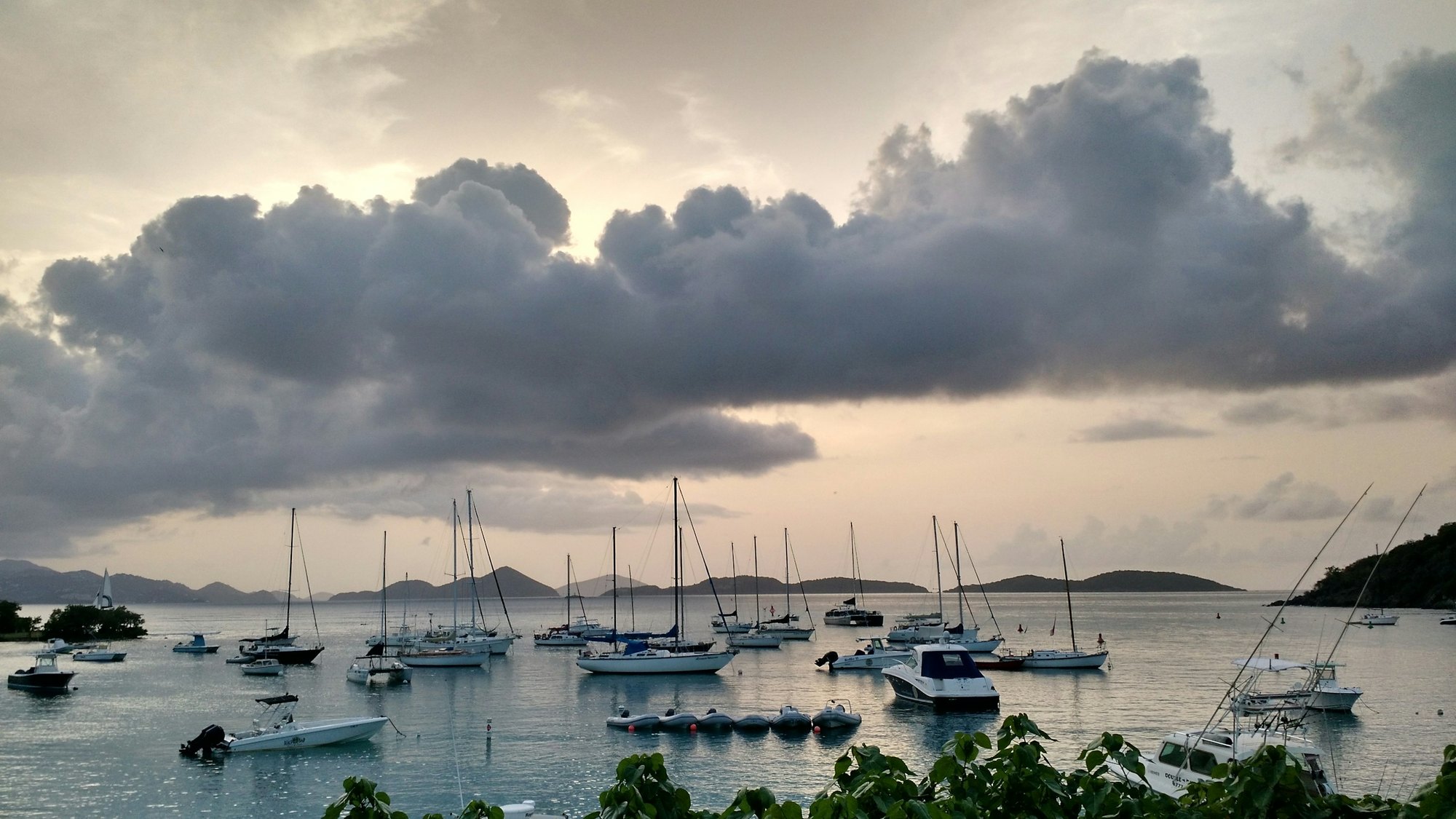 Sailboats moored in a Caribbean harbor