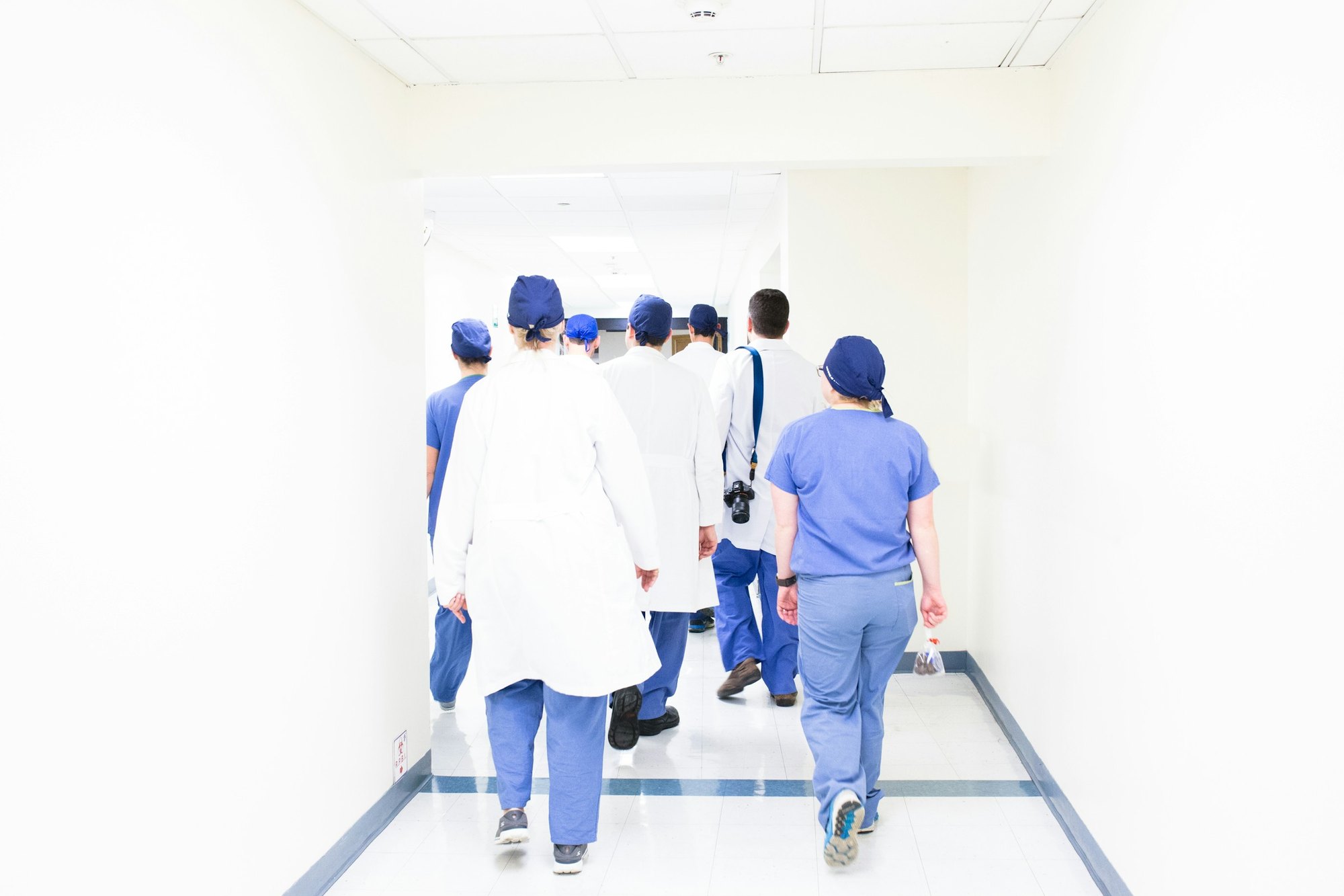 Doctors walking down a hospital corridor