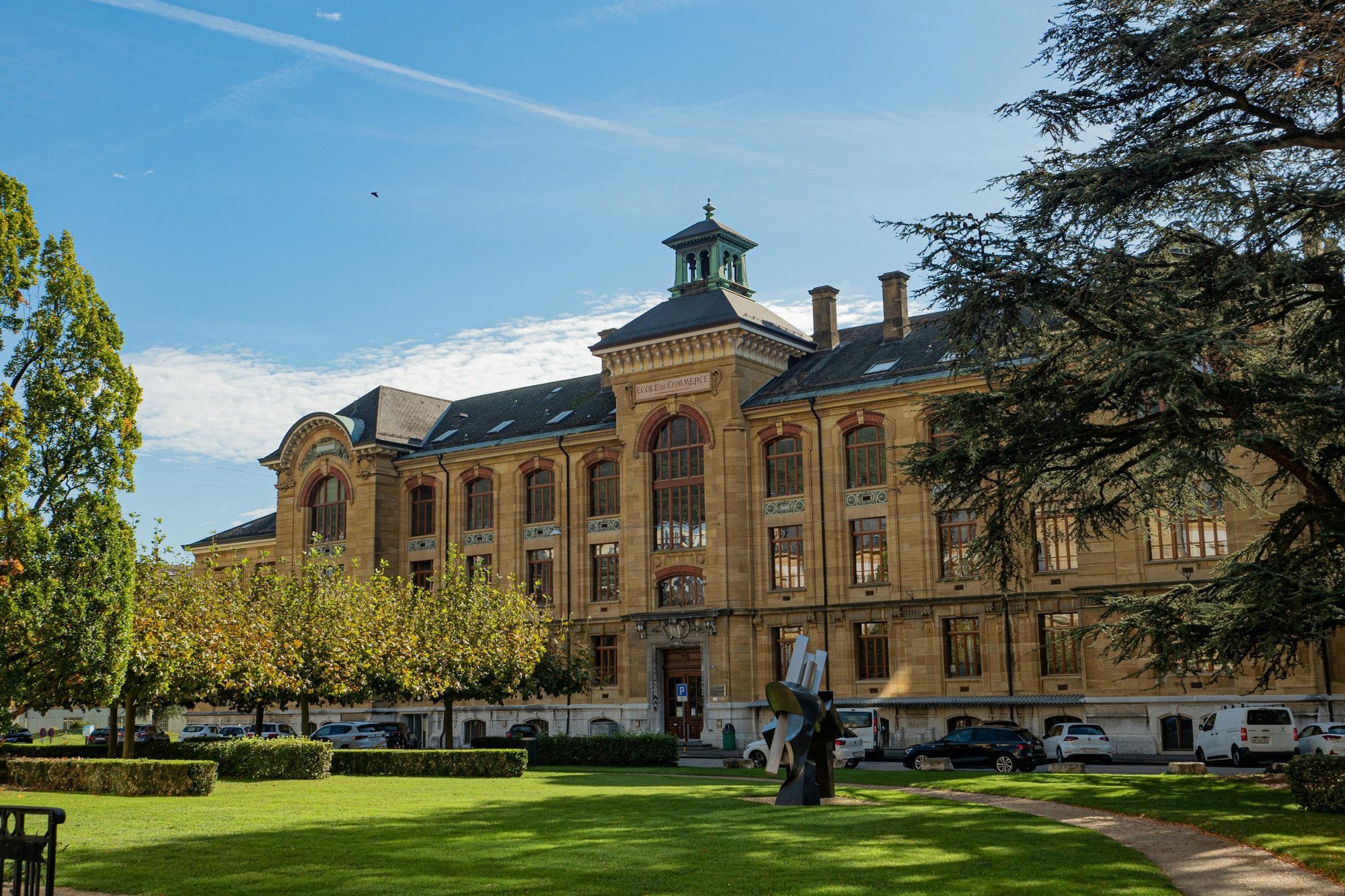 A historic university building and lawn