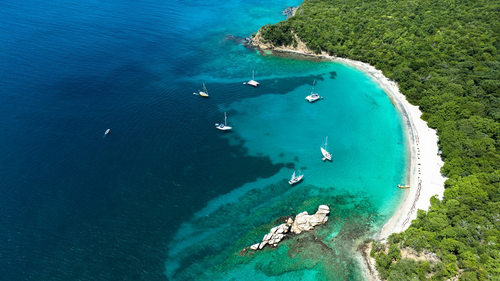 Boats in a turquoise Caribbean bay